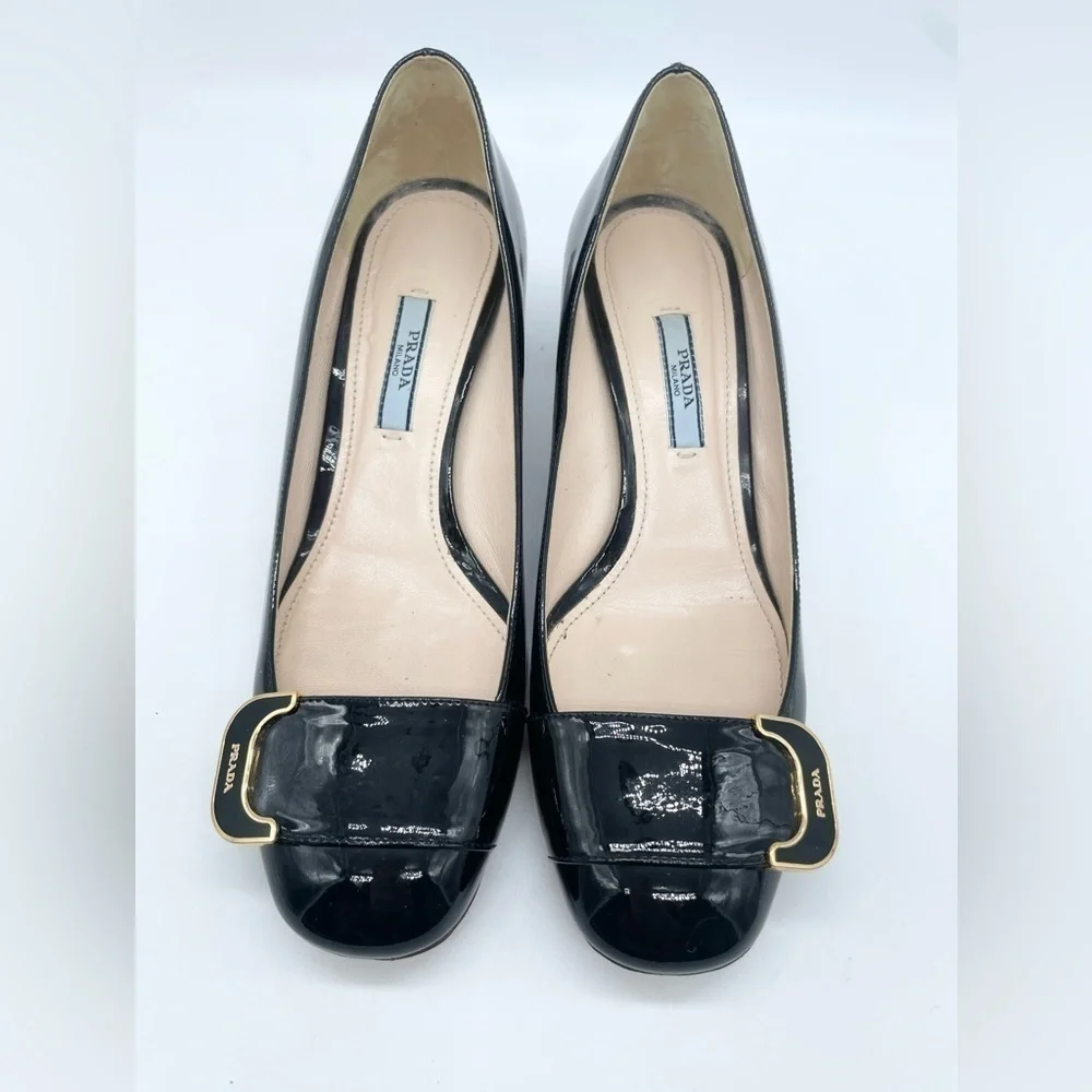 Prada Black Patent leather logo embellished block heel pumps EU37